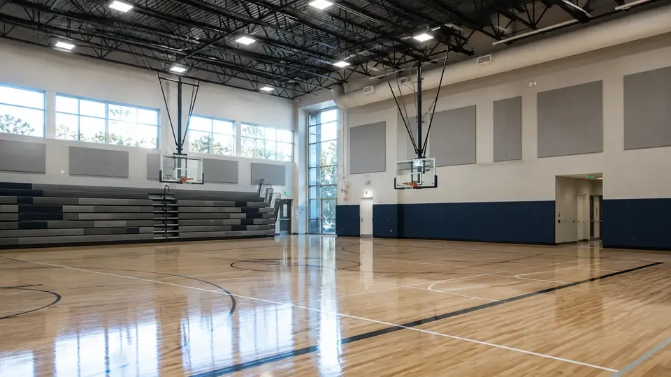 Illustrative multi-use event venue with open circulation and spectator seating.